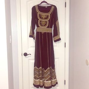 Middle eastern dress in black and gold
